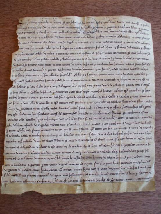 Charter of John de Tournebu, confirming gifts of the Moulines family to the abbey of Barbery (1234).  Caen, AD Calvados, H 1708 (reproduced by permission of the Archives du Calvados).
