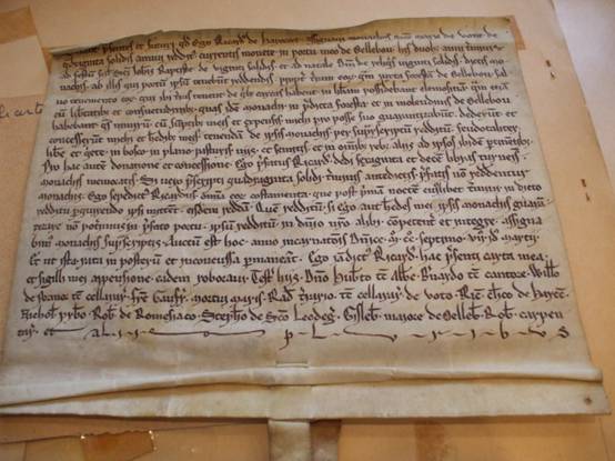 Act of Richard de Harcourt, granting 40 shillings p.a. from his port at Elbeuf-sur-Seine to the abbey of Le Valasse near Lillebonne (15 Mar. 1208, n.s.).  Rouen, AD Seine-Maritime, 18 HP 2 (reproduced by permission of the Archives de la Seine-Maritime).